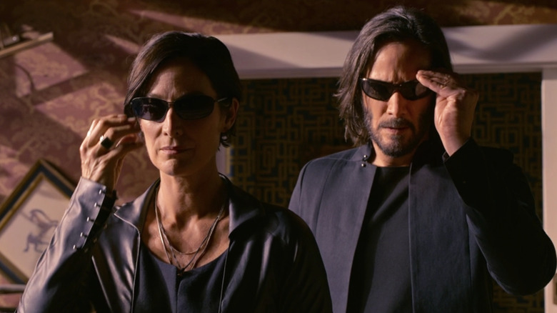 Neo and Trinity confronting the analyst