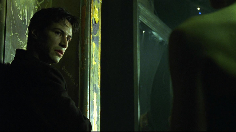Neo (Keanu Reeves) meets Trinity (Carrie-Anne Moss) in The Matrix