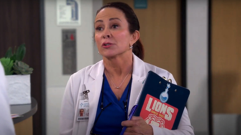 Patricia Heaton as Carol, leading a meeting in a hospital in Carol's Second Act