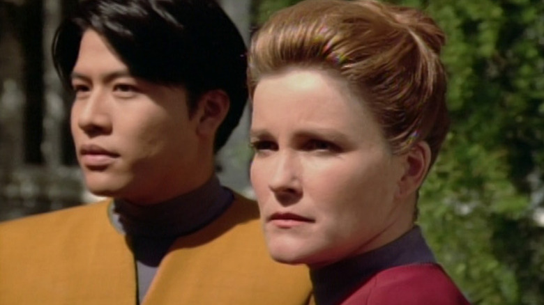 Harry Kim and Captain Janeway from Star Trek: Voyager to the Caretaker's Homeworld