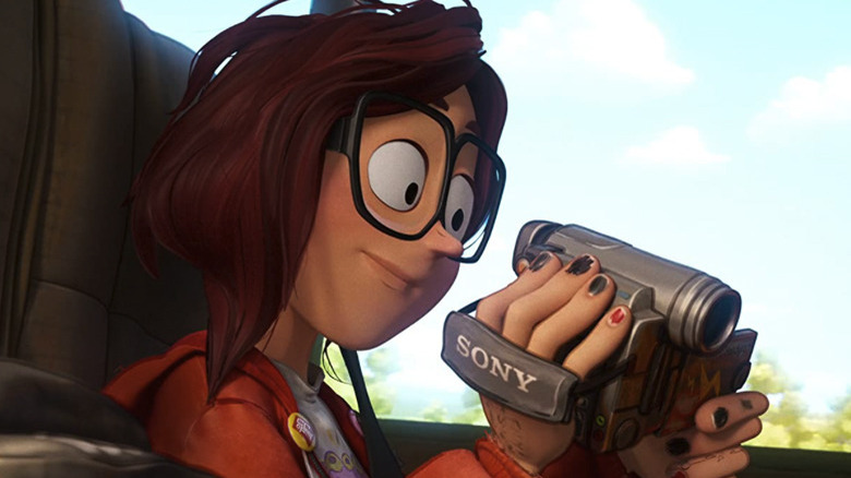Katie Mitchell with a video camera