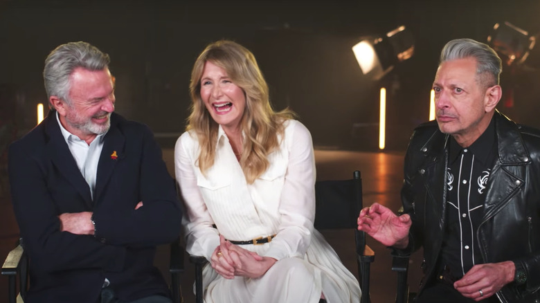 Sam Neill, Laura Dern, and Jeff Goldblum talking Jurassic Park