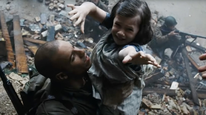 Caparzo helps a little girl