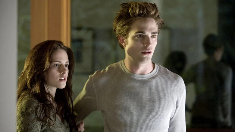 Bella and Edward looking shocked in The Twilight Saga: Breaking Dawn - Part 1
