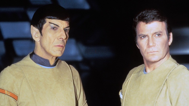 Spock and Kirk stand at attention
