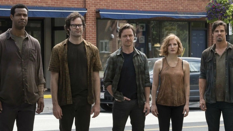 Adult characters looking down in It Chapter Two