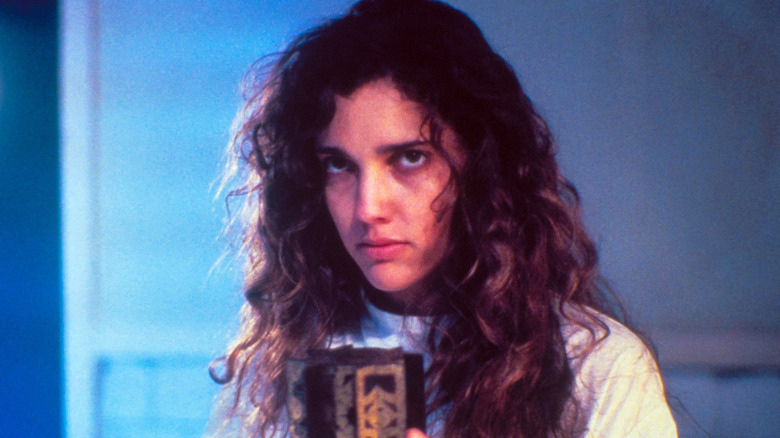 Woman holding mug in Hellraiser