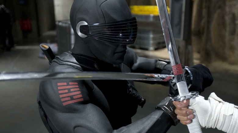 Ray Park engaging in a sword fight