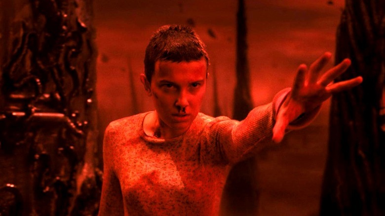 Millie Bobby Brown uses psychic powers as Eleven in "Stranger Things"