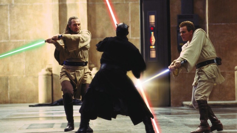 Qui-Gon and Obi-Wan fighting Darth Maul in Star Wars: The Phantom Menace