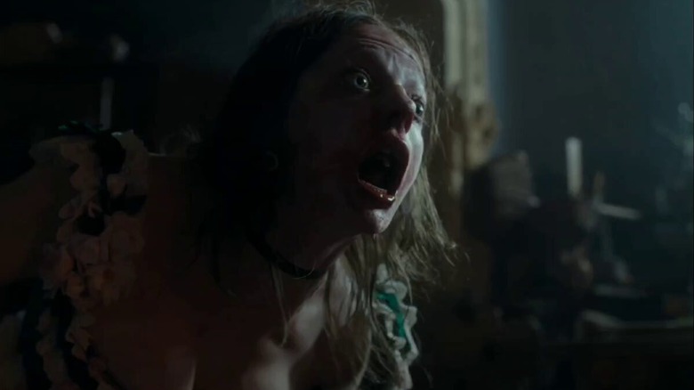 Elvira barfing out the tapeworm in The Ugly Stepsister