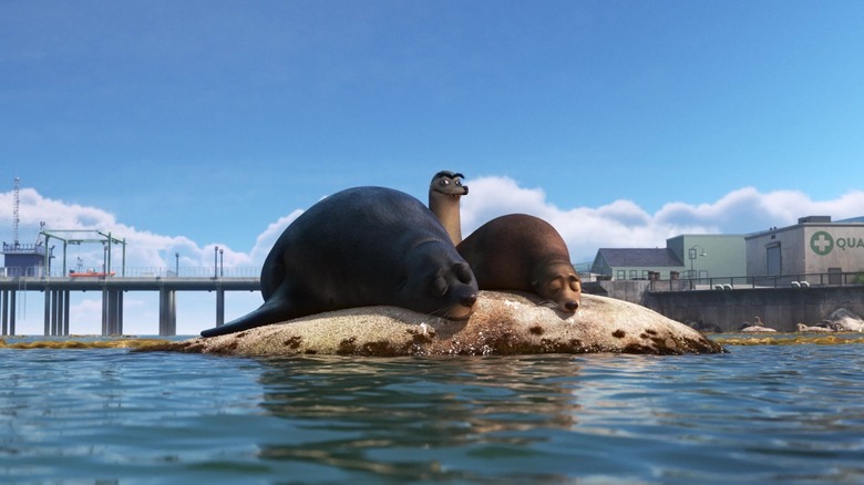Gerald sneaking up behind Fluke and Rubber on the rock