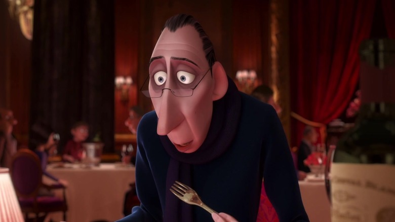 Anton Ego staring down at dish