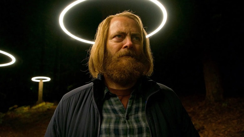 Nick Offerman's Forrest stand beneath an artificial halo in Devs