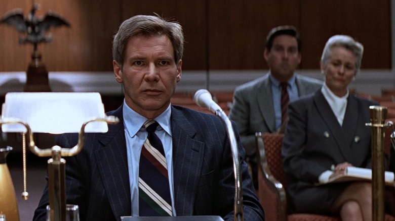 Jacques Ryan gives deposit in front of the microphone in a clear and present danger