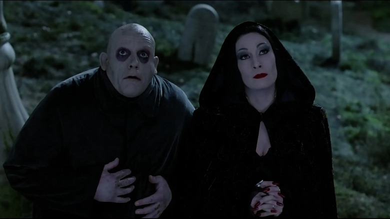 Addams Family Fester Morticia looking graveyard