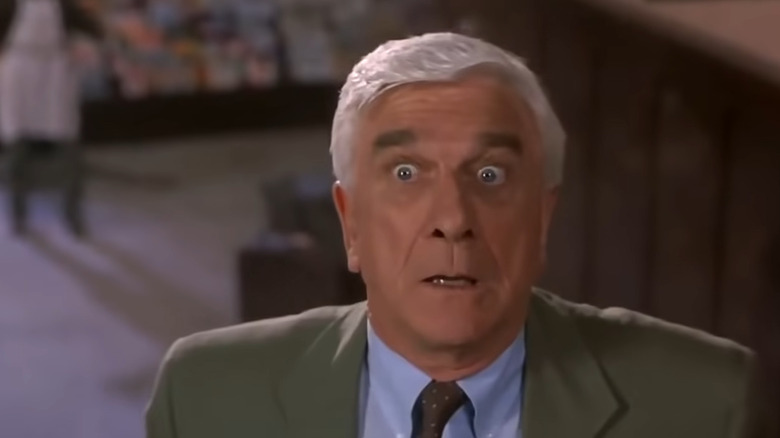 Det. Frank Drebin looking worried in The Naked Gun 33 1/3