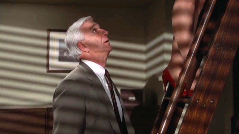 Det. Frank Drebin looking up Jane Spencer's dress in The Naked Gun: From the Files of Police Squad!