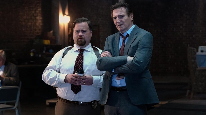 Ed Hocken Jr. and Frank Drebin Jr. looking perplexed in The Naked Gun (2025)