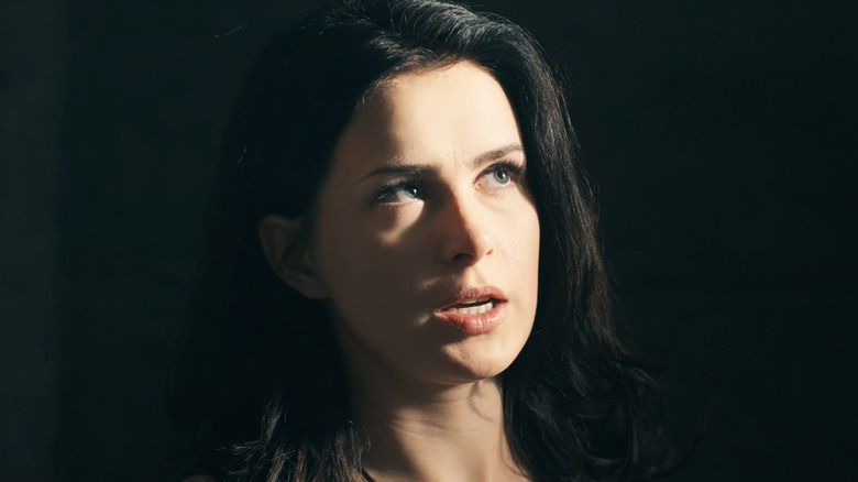 Anna-Maria Sieklucka's Laura Biel looks to her left in closeup in 365 Days