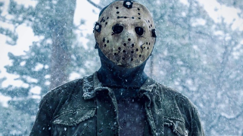 Jason Voorhees standing in the snow in Never Hike in the Snow