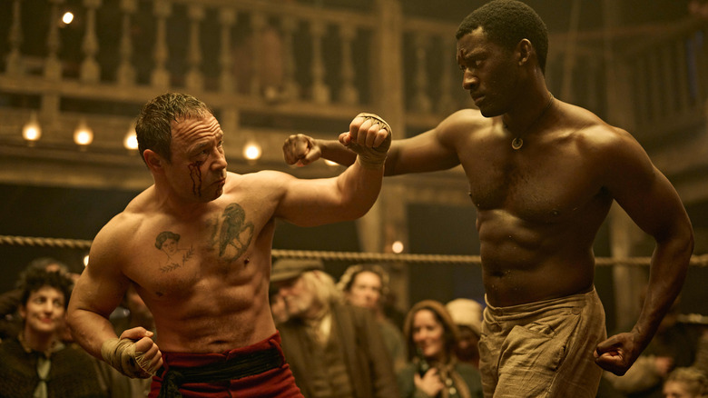 Stephen Graham as Henry "Sugar" Goodson fighting against Malachi Kirby as Hezekiah Moscow in the ring in A Thousand Blows