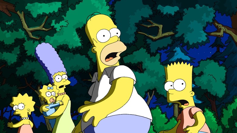Bart, Homer, Marge, Maggie, and Lisa looking in shock in The Simpsons Movie