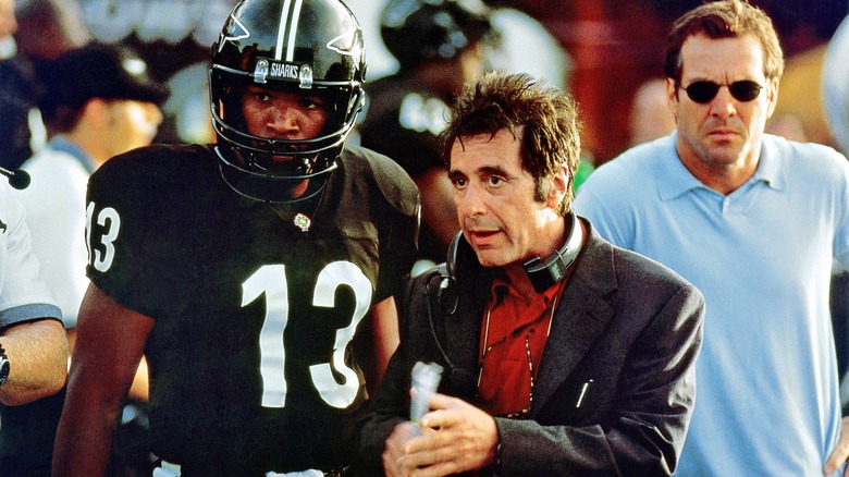 Jamie Foxx, Al Pacino, and Dennis Quaid on the football sideline in Any Given Sunday