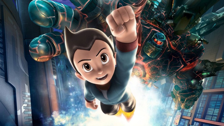 2009 poster of Astro Boy being chased by a giant robot