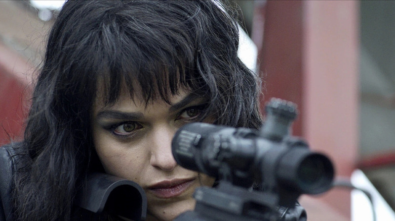Eve Harlow takes aim with a high-powered rifle as Ellen in The Night Agent
