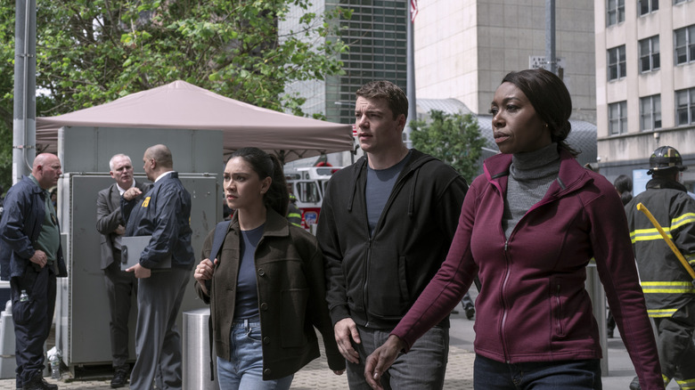 Luciane Buchanan as Rose Larkin, Gabriel Basso as Peter Sutherland, Amanda Warren as Catherine in The Night Agent