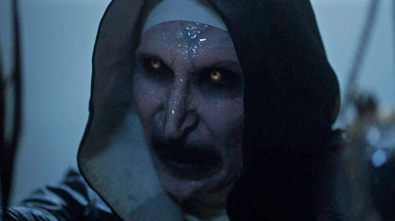 Bonnie Aarons as Valalk soaking wet during the climax of The Nun