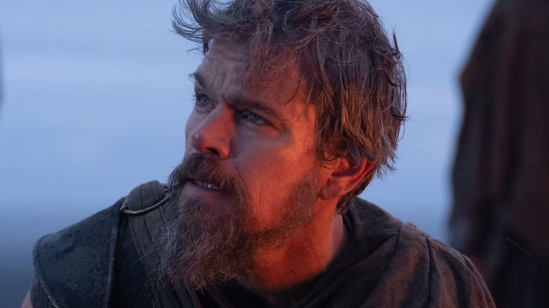 Matt Damon as Odysseus on his knees in The Odyssey