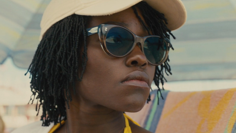 Lupita Nyong'o's Adelaide Wilson looks off to her left in closeup in Us.jpg