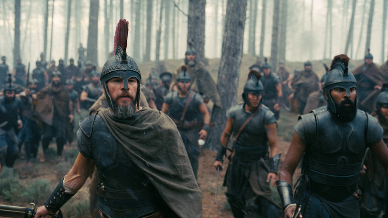 Odysseus and his men looking scared in the woods in The Odyssey