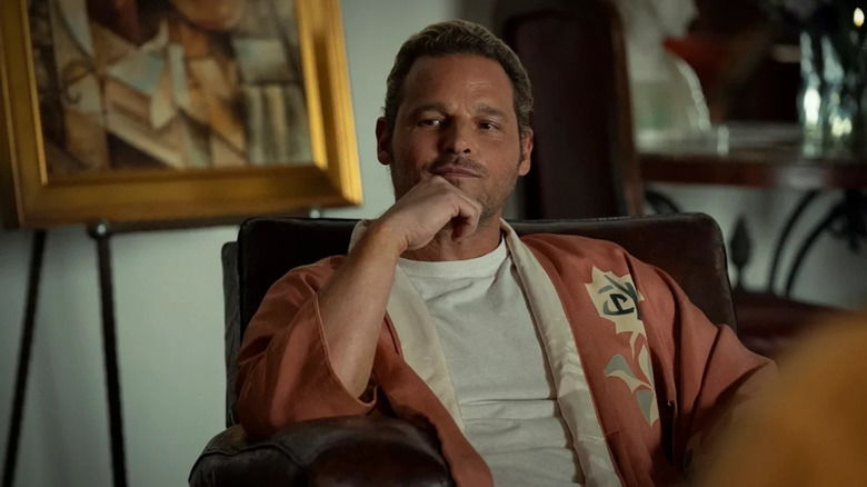 The Offer guy seated in a chair