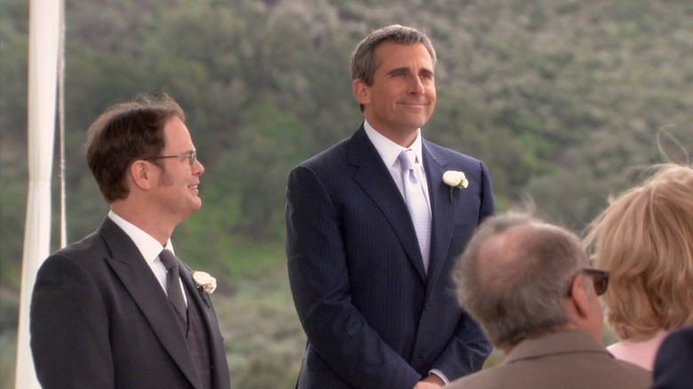 Rainn Wilson's Dwight Shrute looks across at Steve Carell's Michael Scott during Dwight's wedding ceremony in The Office