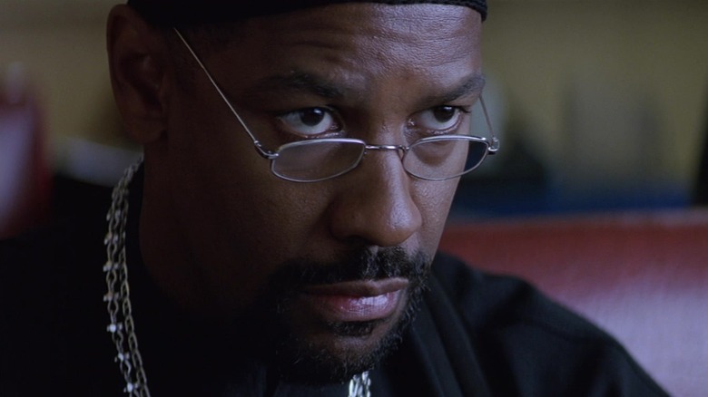 Denzel Washington's Alonzo Harris looks over his glasses on Training Day