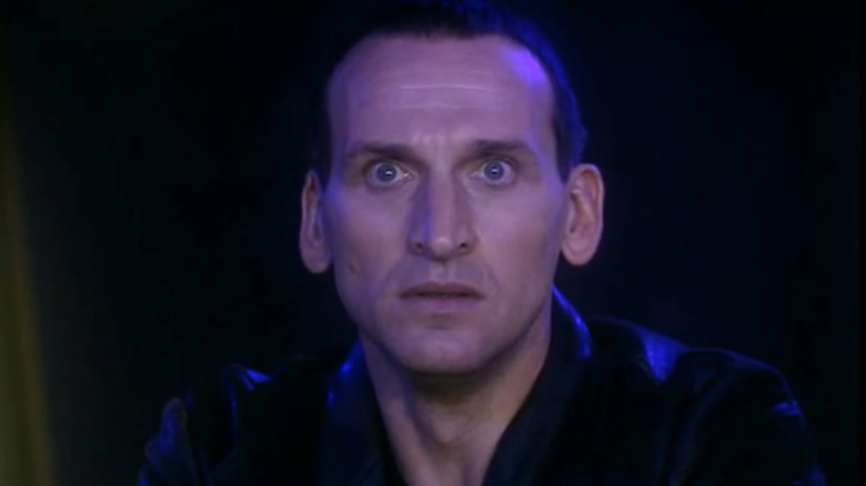 Christopher Eccleston in close-up, looking alarmed
