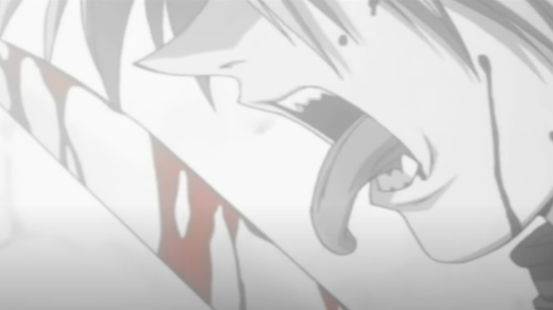 Seras licking a bloody knife in Hellsing