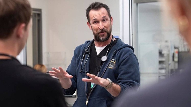 Noah Wyle does his best to maintain order as Dr. Michael 