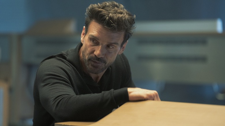 Frank Grillo as Rick Flag leaning on a monitor in Peacemaker season 2