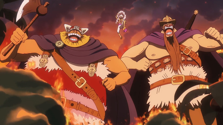 Dorry and Brogy walking gleefully with Luffy on Egghead in One Piece