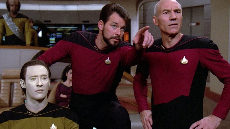 Data, Riker, Picard look on