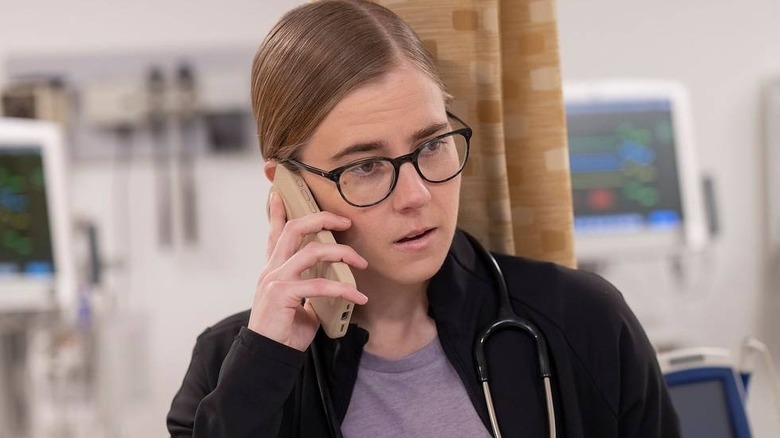 Mel on the phone on The Pitt