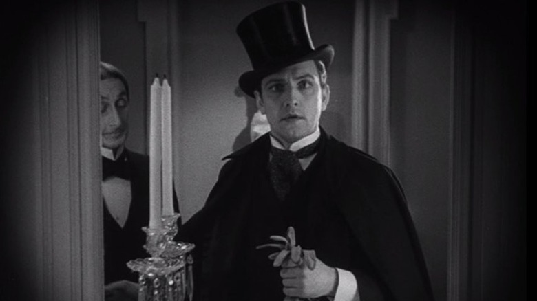 Dr. Jekyll staring straight ahead in Dr. Jekyll and Mr. Hyde