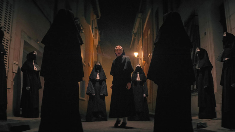 The Nun II irene surrounded nuns