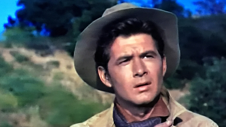 Gary Clarke (Steve Hill) looking to the side on The Virginian