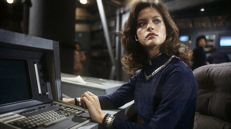 Athena (Maren Jensen) sitting at a console in Battlestar Galactica 1978