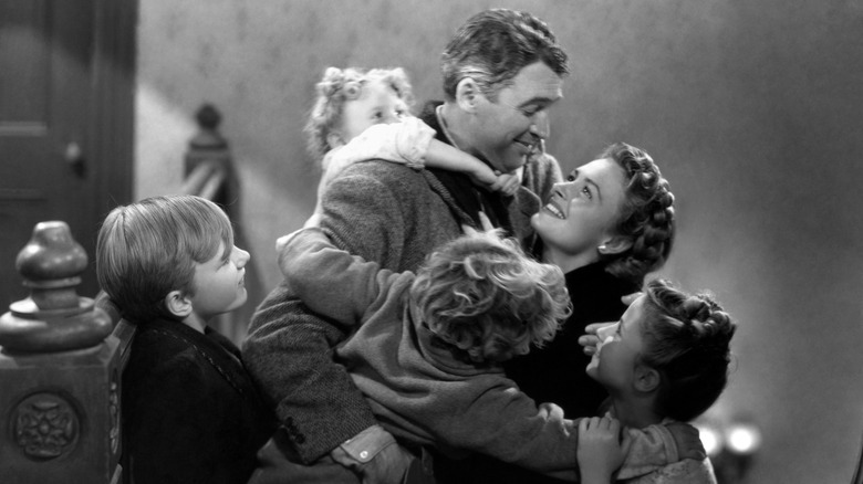 Larry Simms, Karolyn Grimes, Jimmy Stewart, Jimmy Hawkins, Donna Reed, and Carol Coombs in It's A Wonderful Life